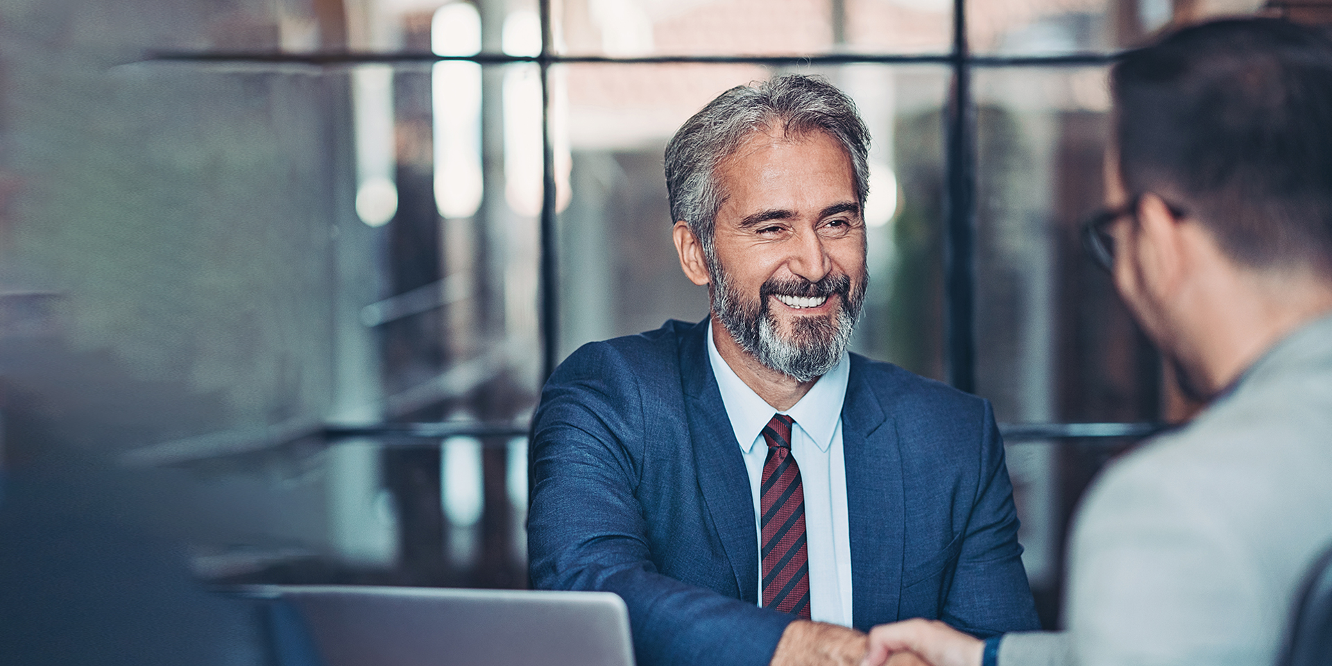 A businessman meeting with clients.