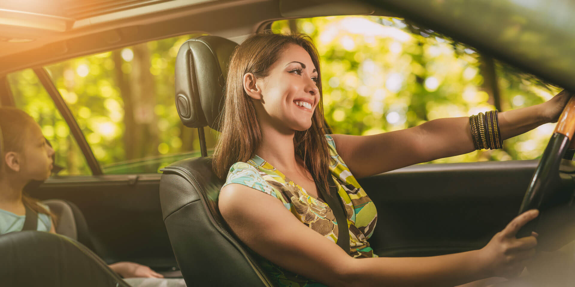 A woman driving her new car