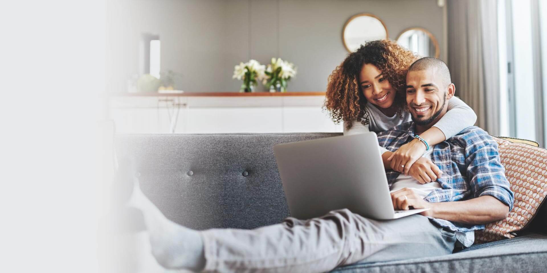 A couple enrolling in Online Banking