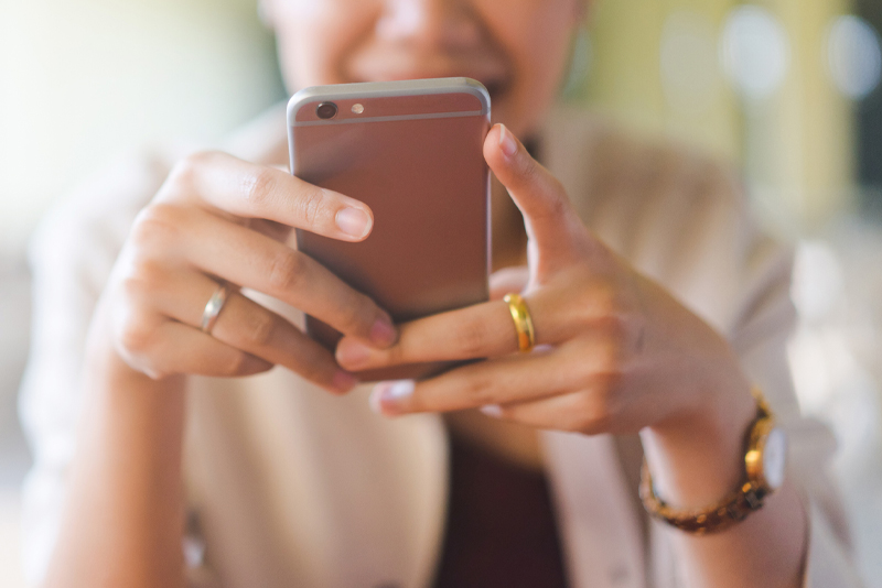 A woman on her mobile device