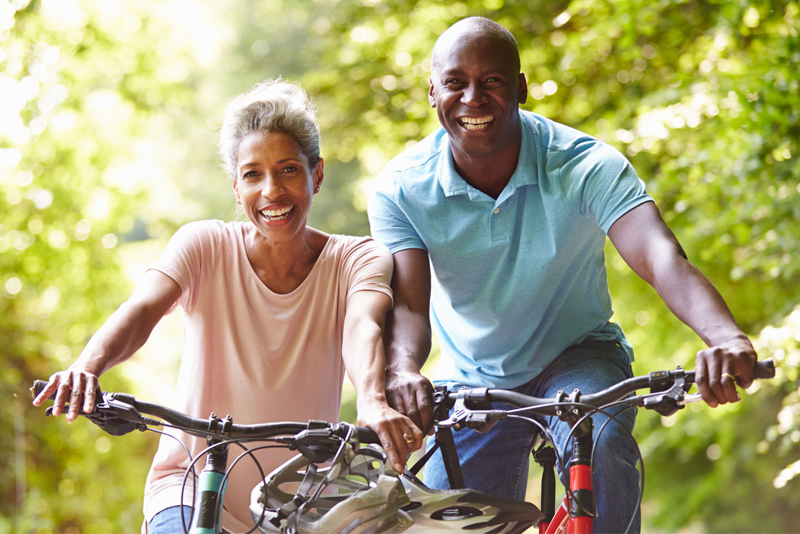 Two people taking a ride on their bikes