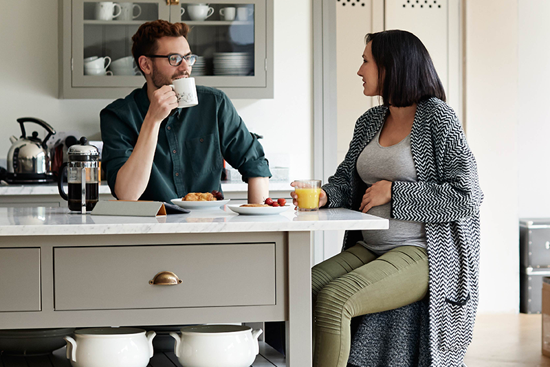 A couple drinking coffee together