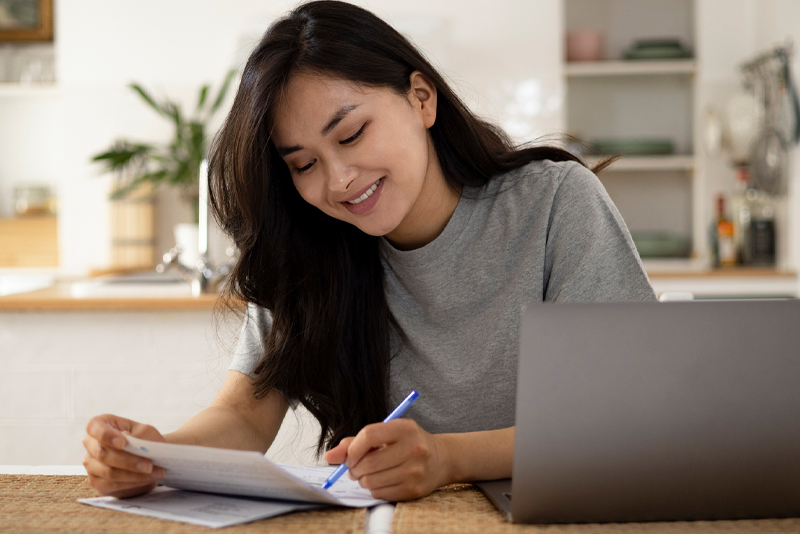 A woman creating a budget